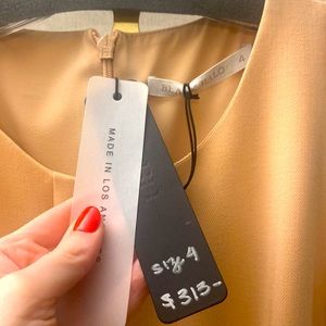 Black halo new with tags dress size 4 great condition NEVER WORN cream color